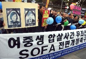 Korean citizens protest death of 2 schoolgirls
